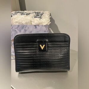 Authentic preowned Mario Valentino clutch